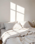 Sateen Bed Sheet Set in Mist Grey on bed
