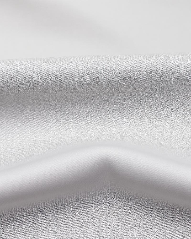 Close-up mist grey sateen fabric texture