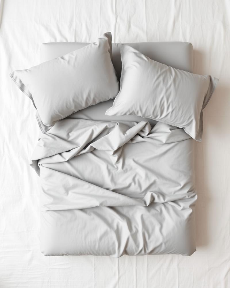 Mist grey sateen sheet set flat lay